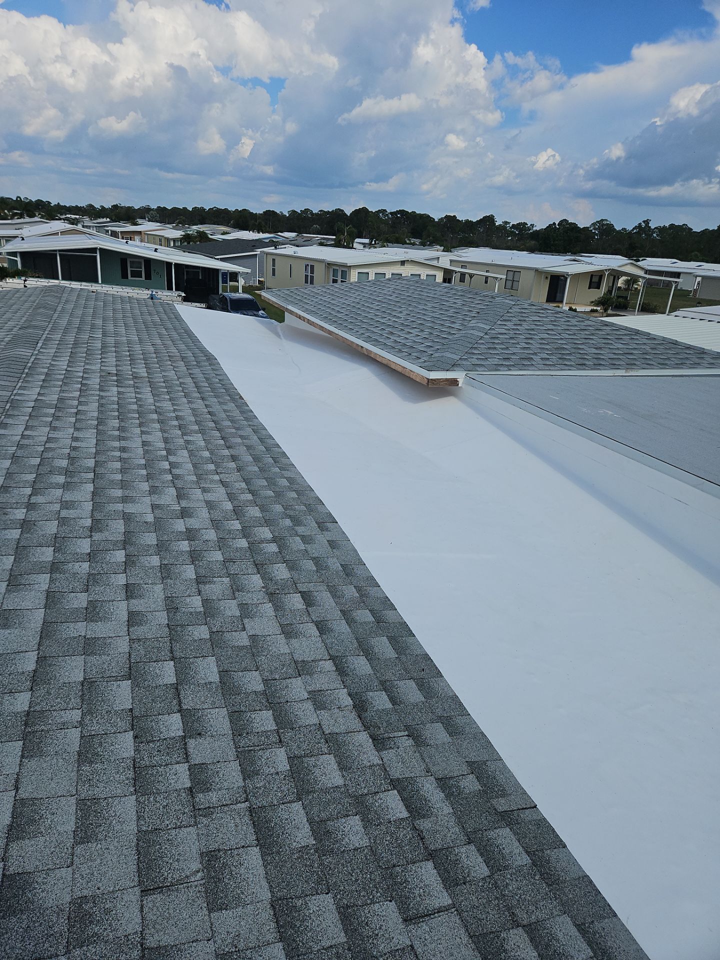 North Port, FL Dead Valley Roof Repair with TPO, Shingle Tie-In & New Wall Flashing Thumbnail