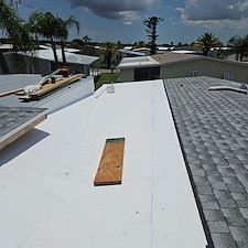 North-Port-FL-Dead-Valley-Roof-Repair-with-TPO-Shingle-Tie-In-New-Wall-Flashing 5